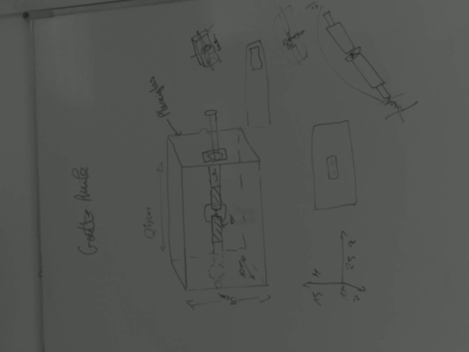 Whiteboard design sketch for the oil-drop experiment